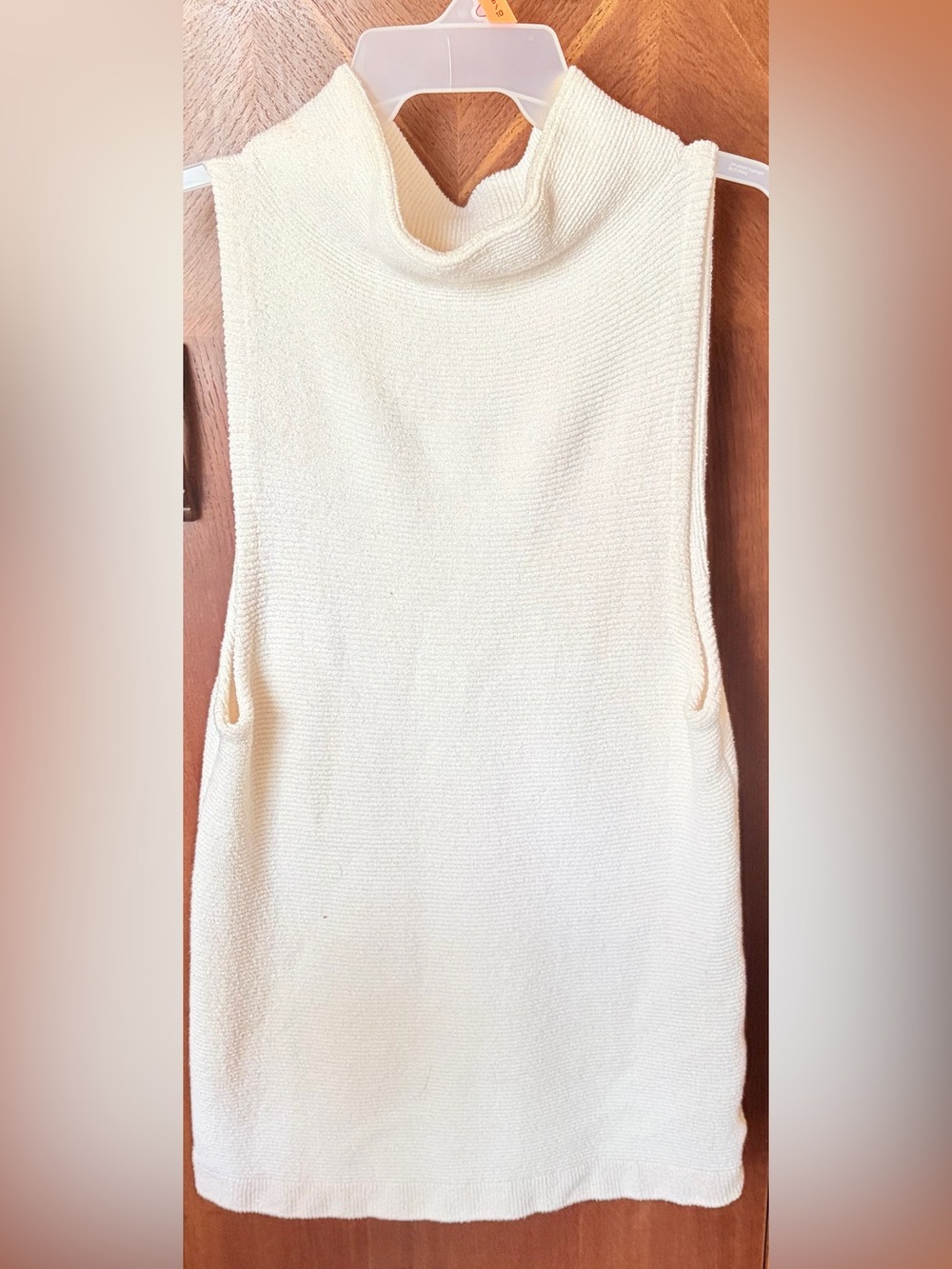 Free People Women's Ribbed Turtle Neck
Sleeveless Dress in Ivory. Like new!